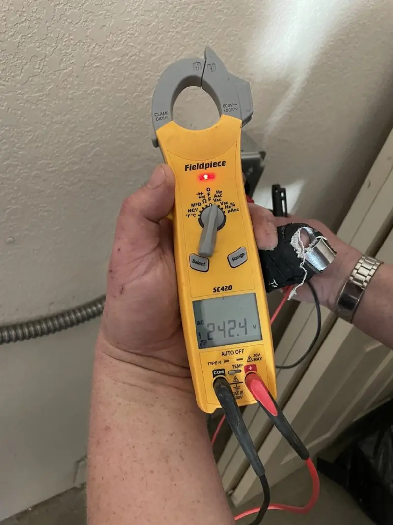 Voltage testing with clamp meter during Aluminum Wiring Replacement in Rye Brook